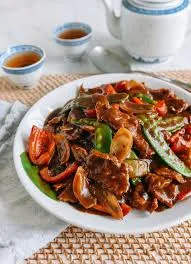 Sliced beef black bean sauce with sizzling plate